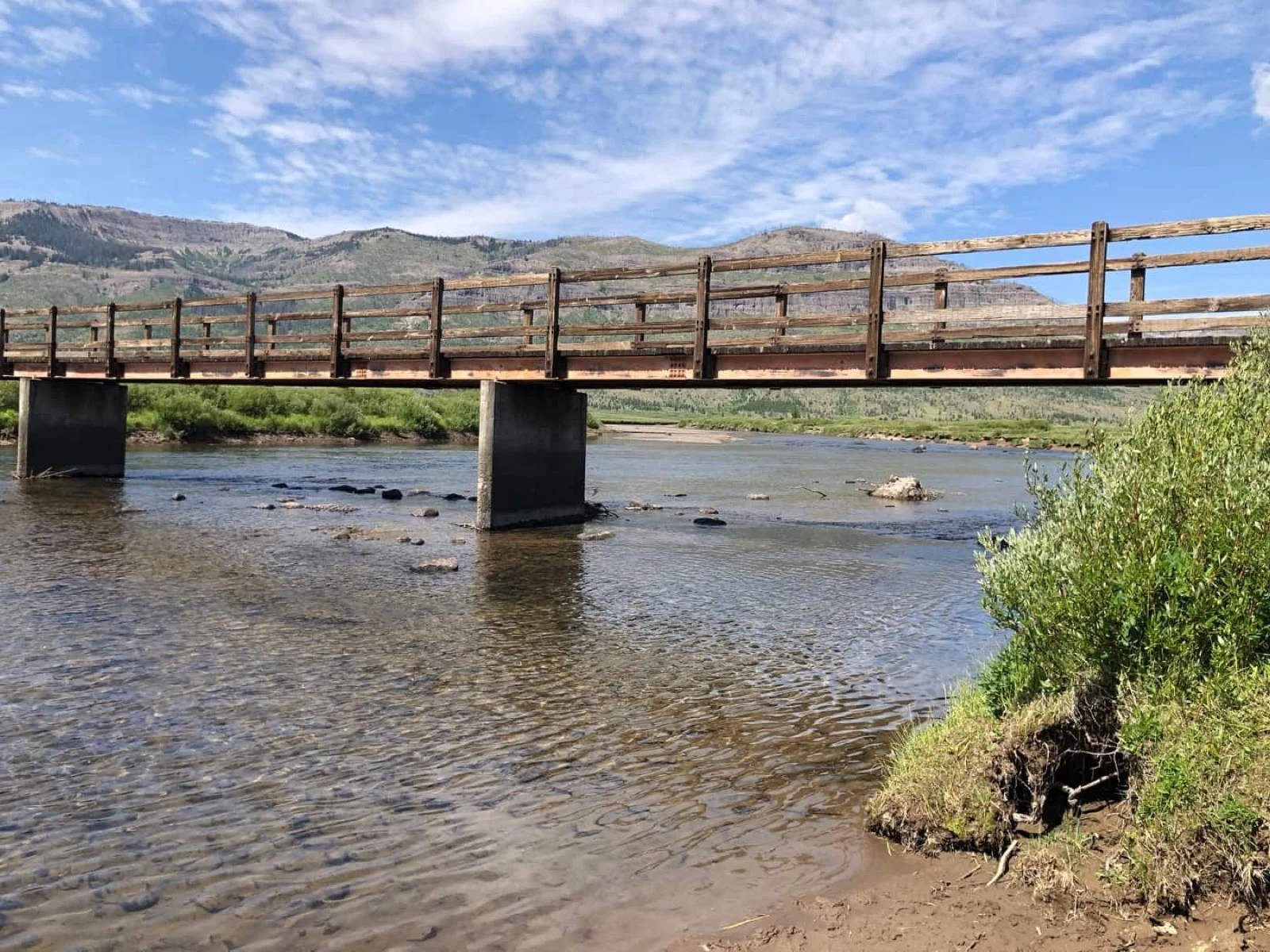 Hawks Rest bridge crossing over the Yellowstone River in the Teton Wilderness